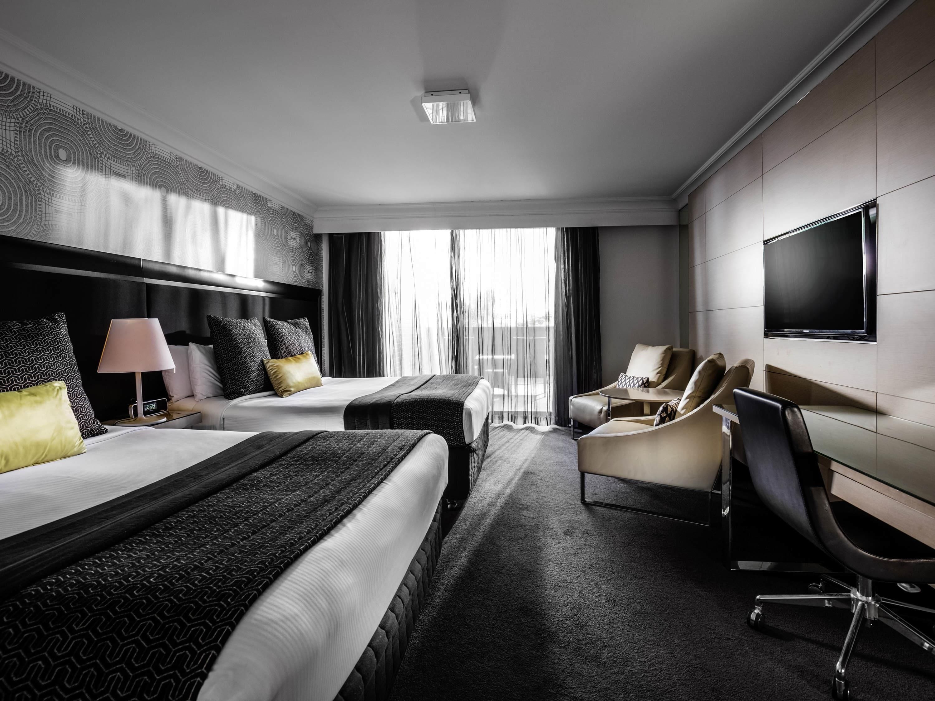 Deluxe Twin Room, 2 Twin Beds, Balcony | In-room safe, desk, laptop workspace, blackout drapes