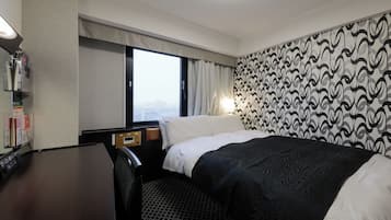 Down duvets, desk, laptop workspace, blackout curtains