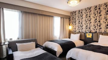 Down duvets, desk, laptop workspace, blackout curtains