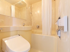 Combined shower/tub, deep soaking tub, free toiletries, hair dryer