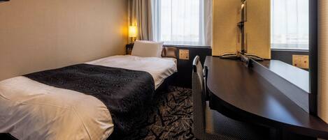 Desk, blackout drapes, iron/ironing board, free WiFi