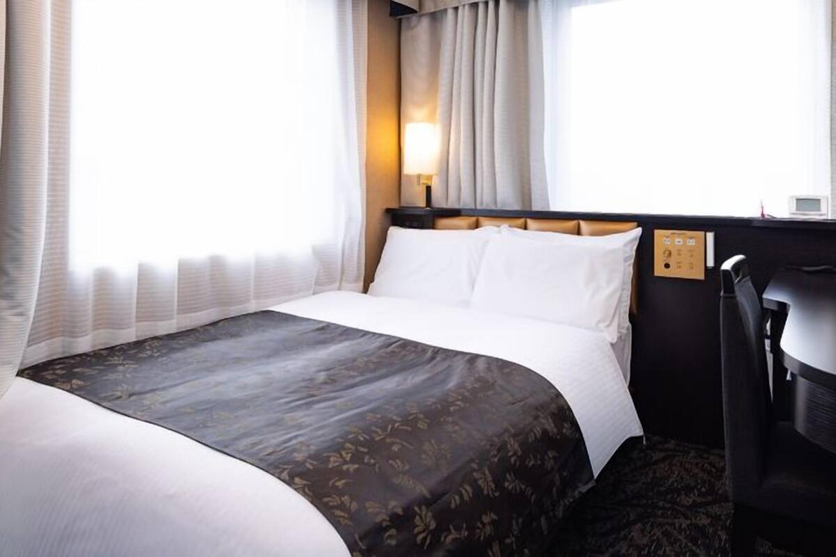 Desk, blackout drapes, WiFi (free), bed sheets