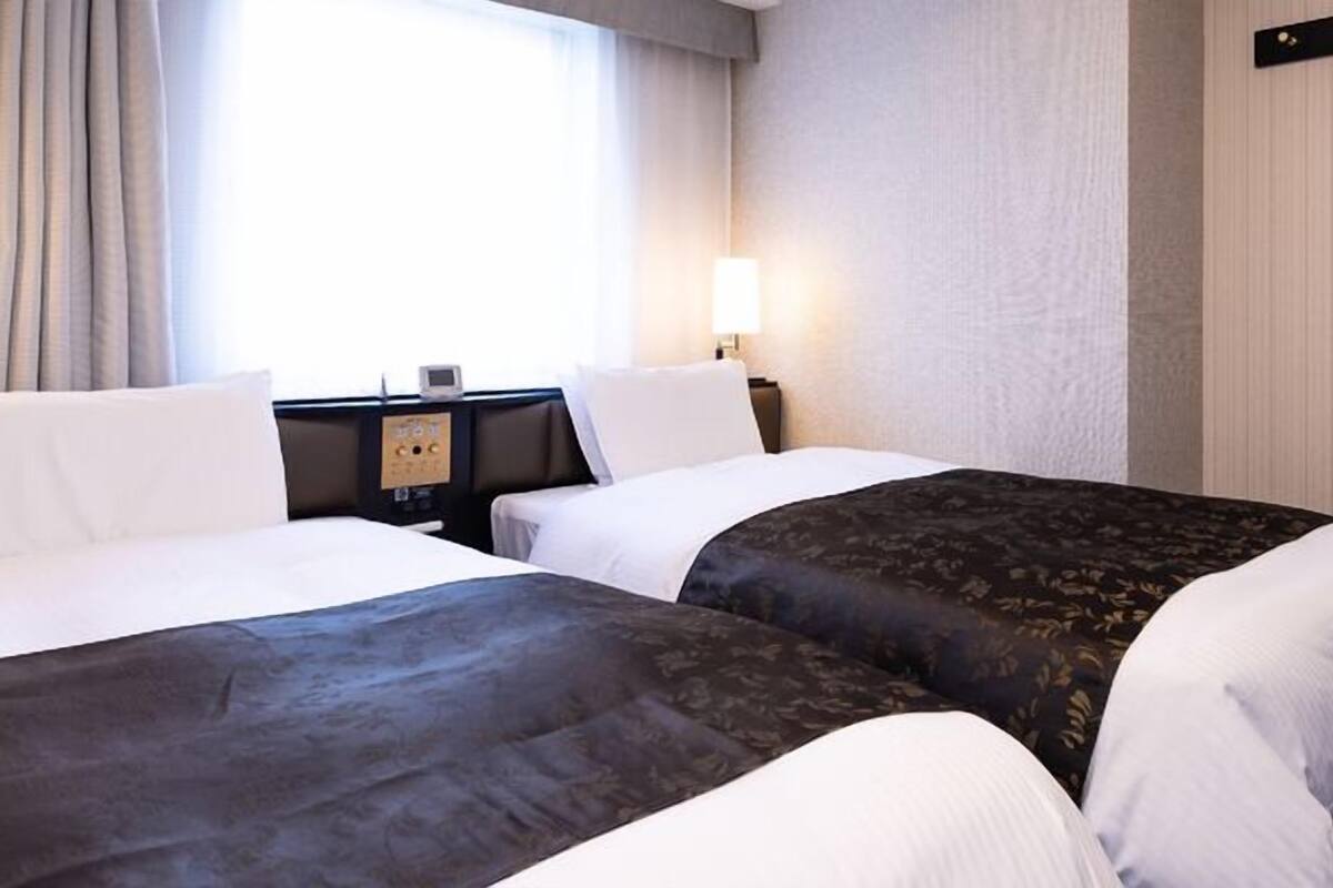 Desk, blackout drapes, WiFi (free), bed sheets