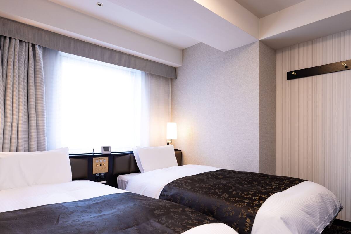 Desk, blackout drapes, WiFi (free), bed sheets