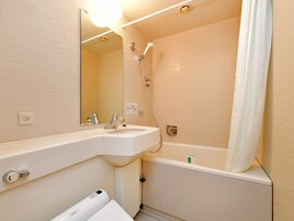 Combined shower/tub, deep soaking tub, free toiletries, hair dryer
