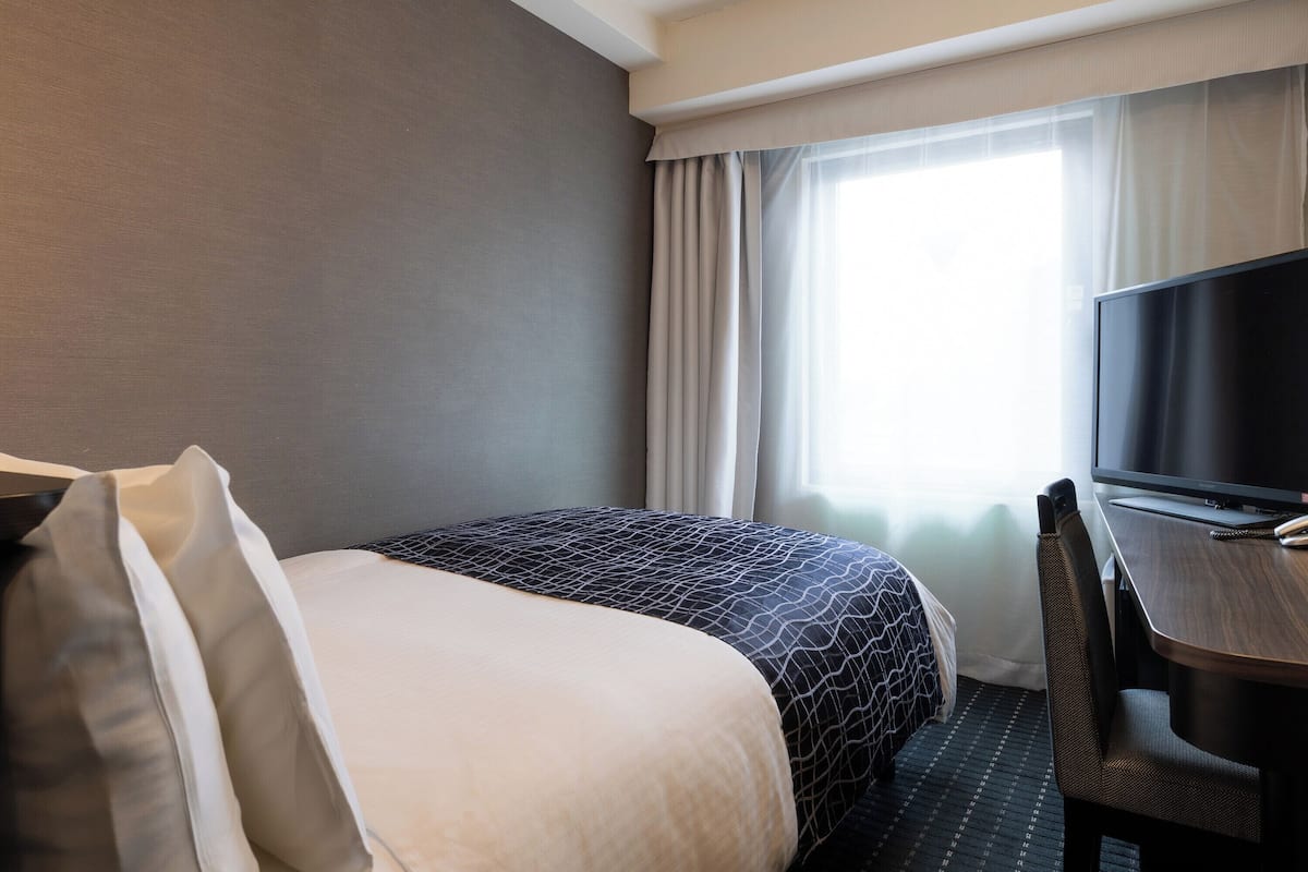 Desk, blackout curtains, free WiFi, bed sheets