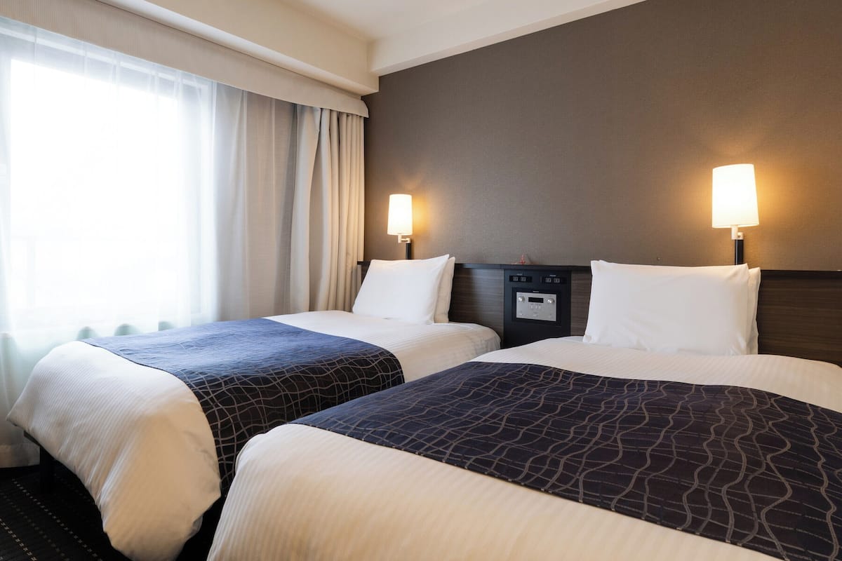 Desk, blackout curtains, free WiFi, bed sheets