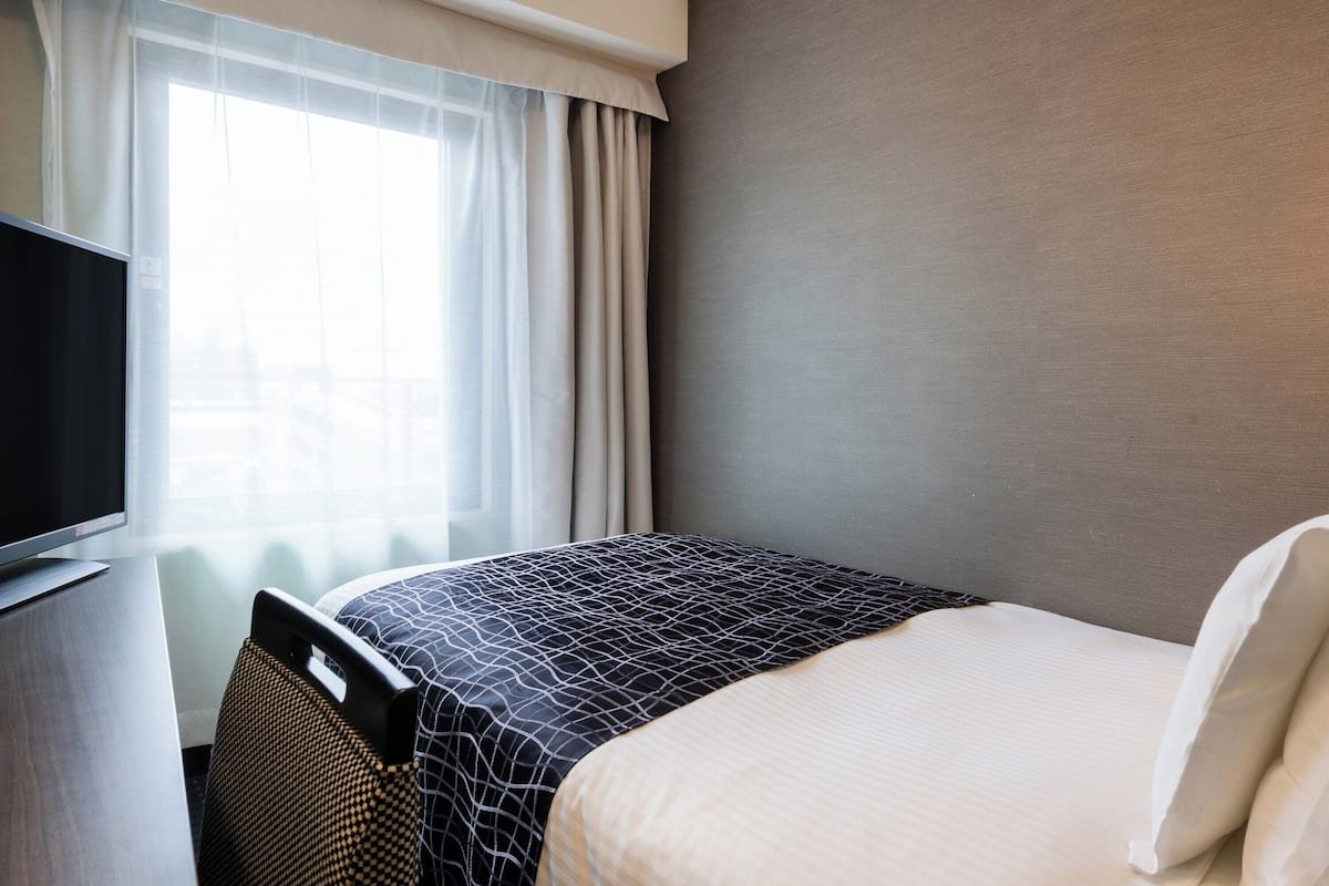 Desk, blackout curtains, free WiFi, bed sheets