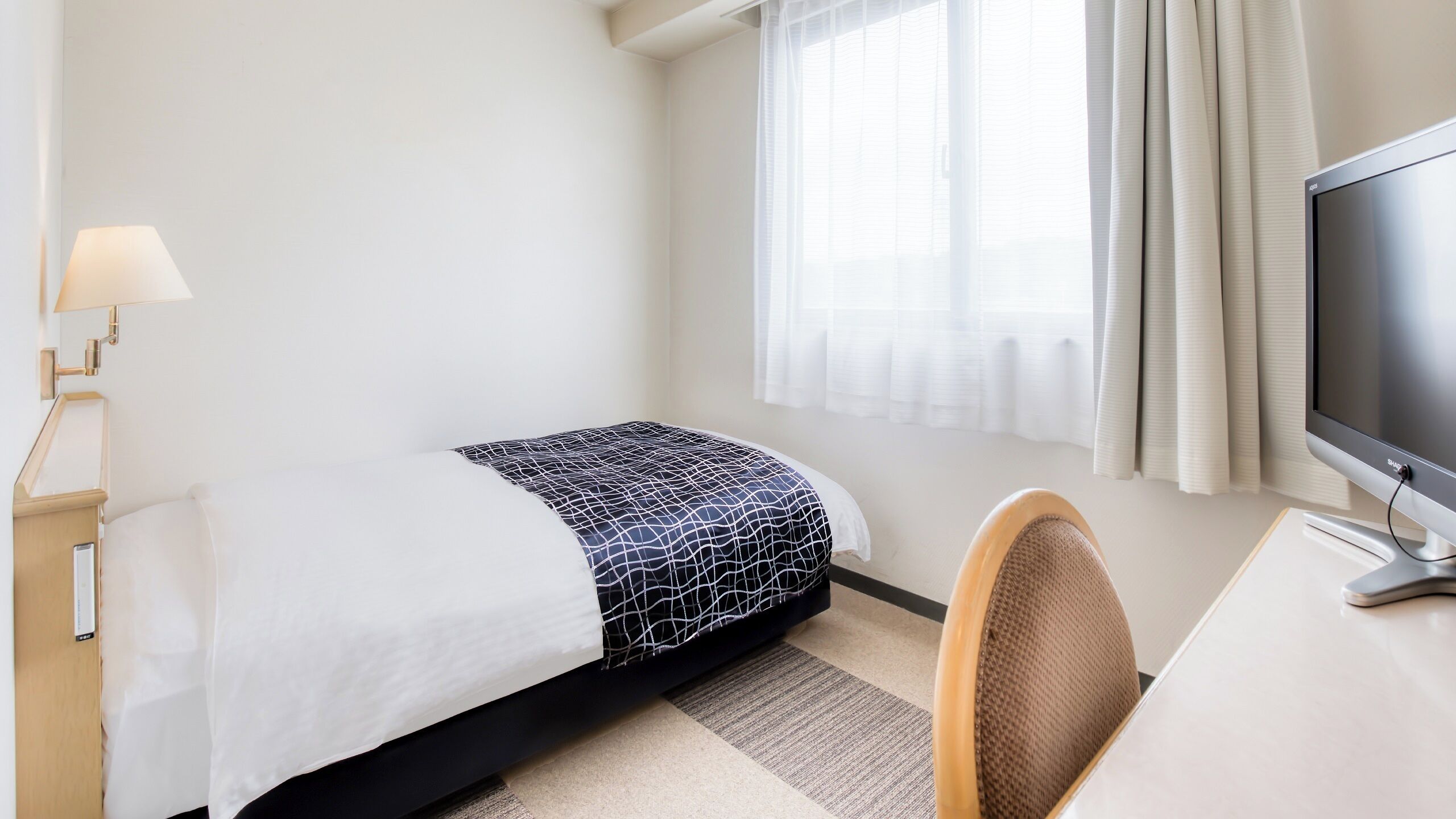 Desk, free WiFi, bed sheets