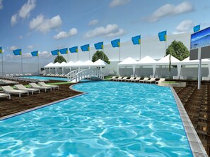 Een seizoensgebonden buitenzwembad, parasols voor strand/zwembad