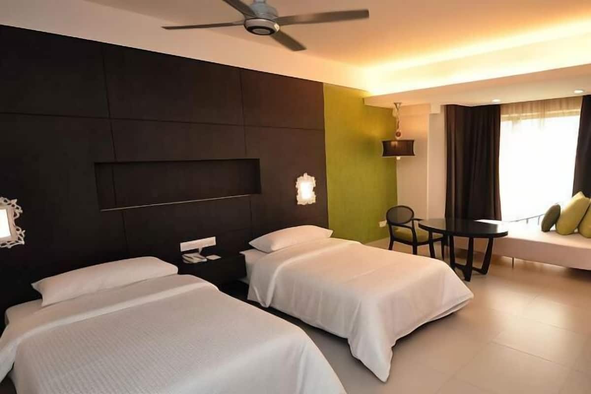 Een minibar, een kluis op de kamer, gratis babybedden, gratis wifi