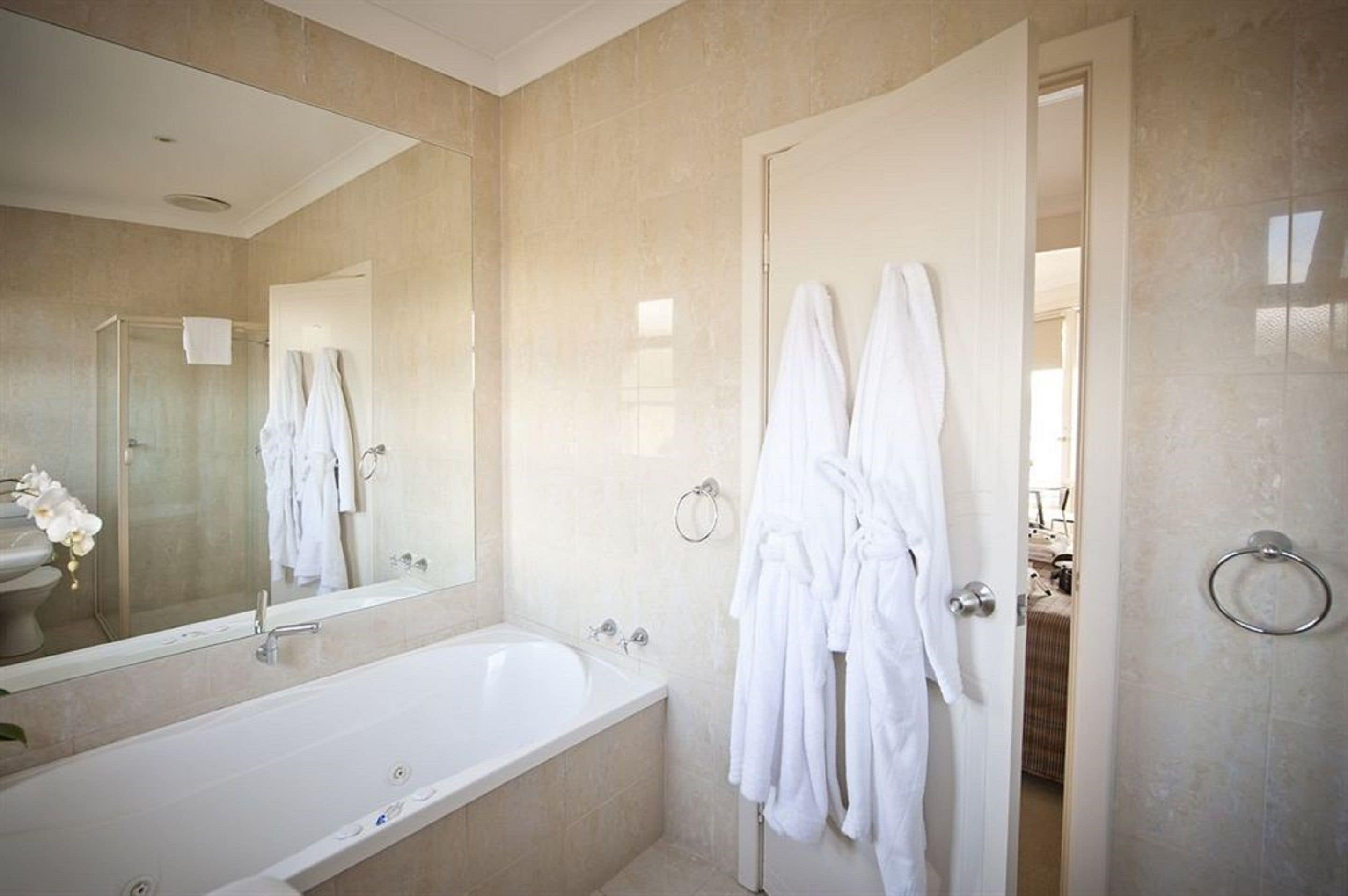 separate bathtub and shower, free toiletries, towels, soap