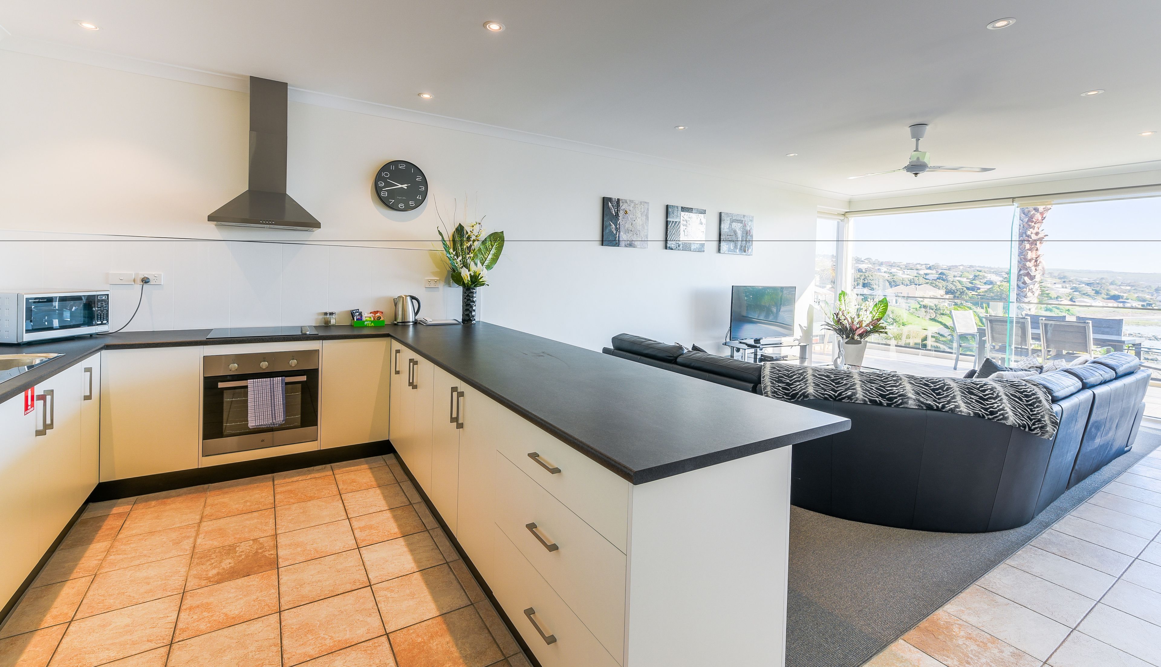 fridge, electric kettle, toaster, dining tables