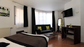 Suite | Ropa de cama de alta calidad y caja de seguridad en la habitación