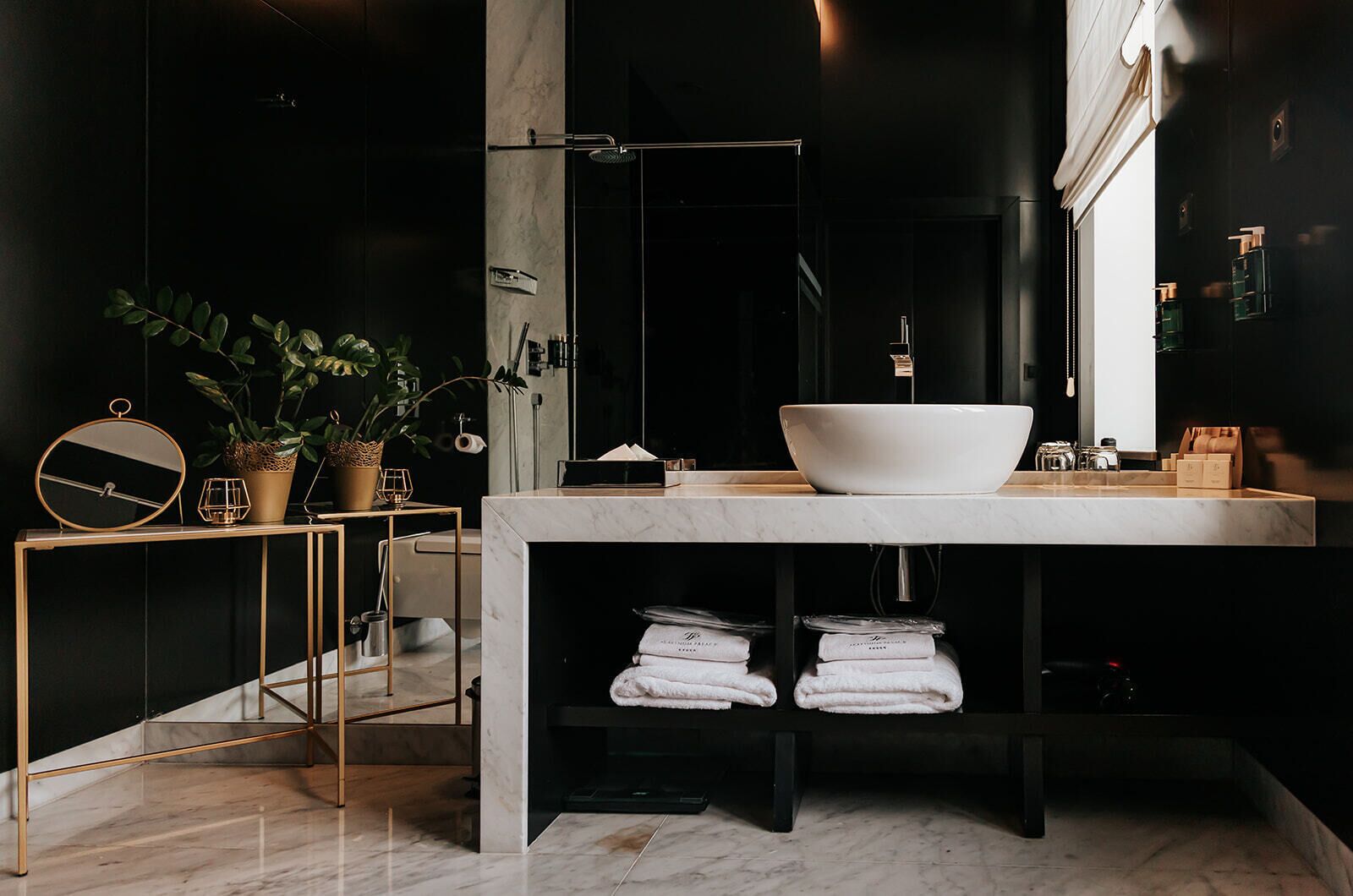 deluxe room | bathroom | rainfall showerhead, free toiletries, hair dryer, bathrobes