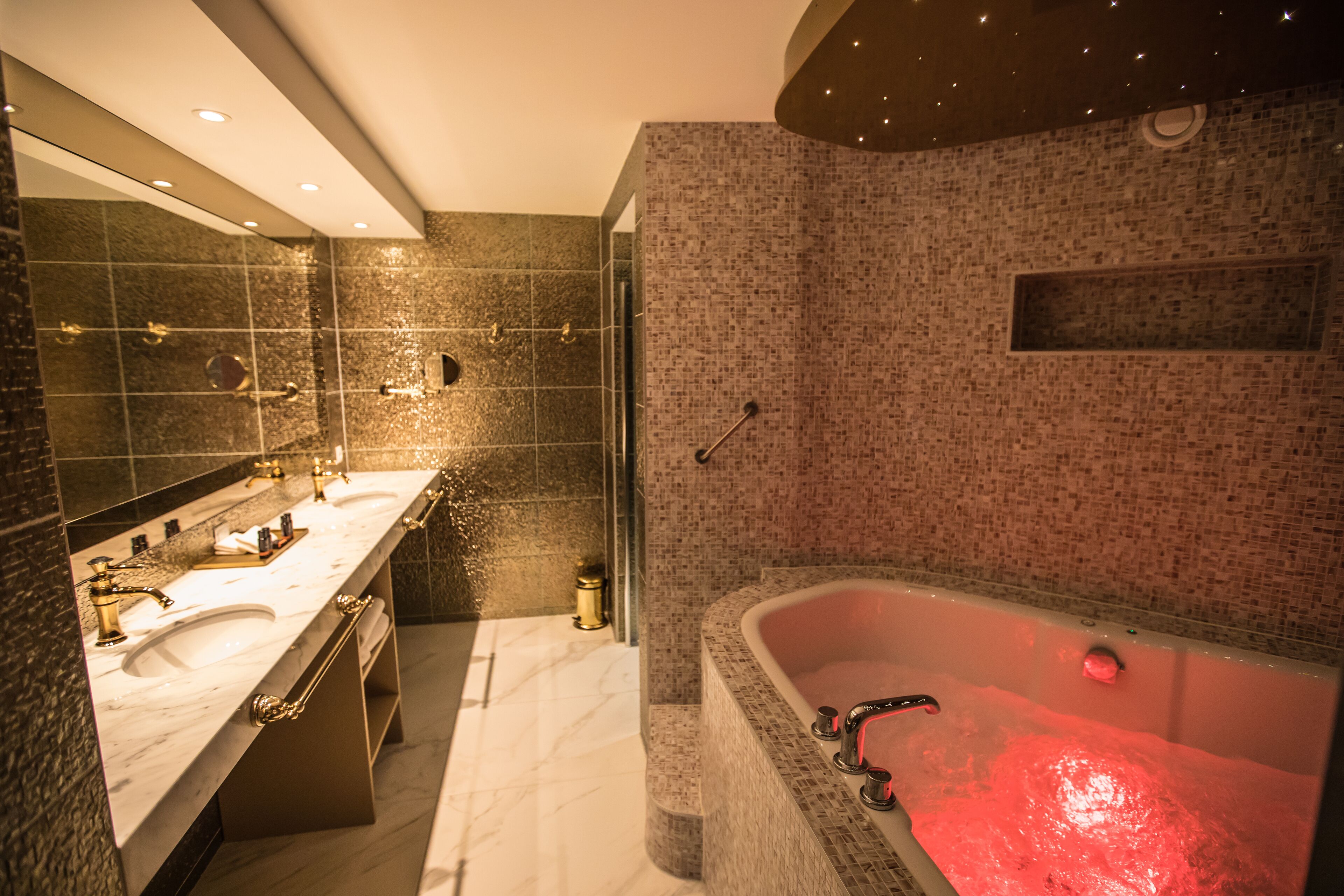 luxury suite (millionaire) | bathroom | hair dryer, towels, soap, shampoo