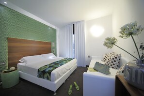 Triple Room | Minibar, in-room safe, desk, blackout drapes - Q Hotel (Rimini)