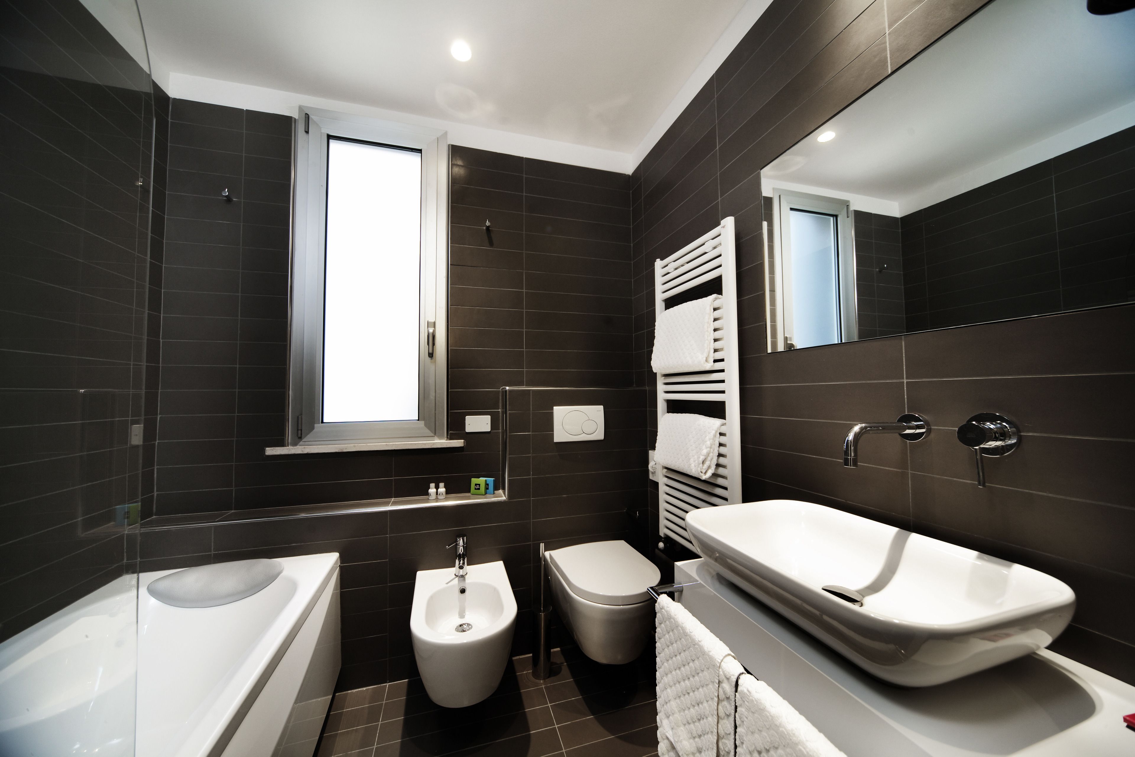superior room | bathroom | rainfall showerhead, free toiletries, hair dryer, bidet