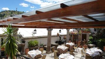 Breakfast, lunch, dinner served; garden views