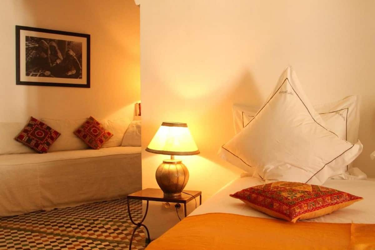 Yellow Room | Premium bedding, in-room safe, desk, iron/ironing board