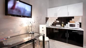 Apartamento standard, cozinha | Comodidades do quarto