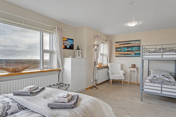 Quadruple Room, Private Bathroom (for 4 people) | Living area | Foosball, books