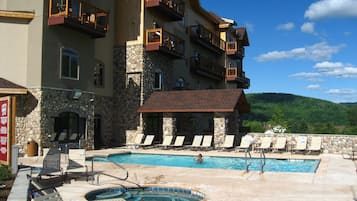 Indoor pool, outdoor pool, open 8 AM to 10:00 PM, pool umbrellas