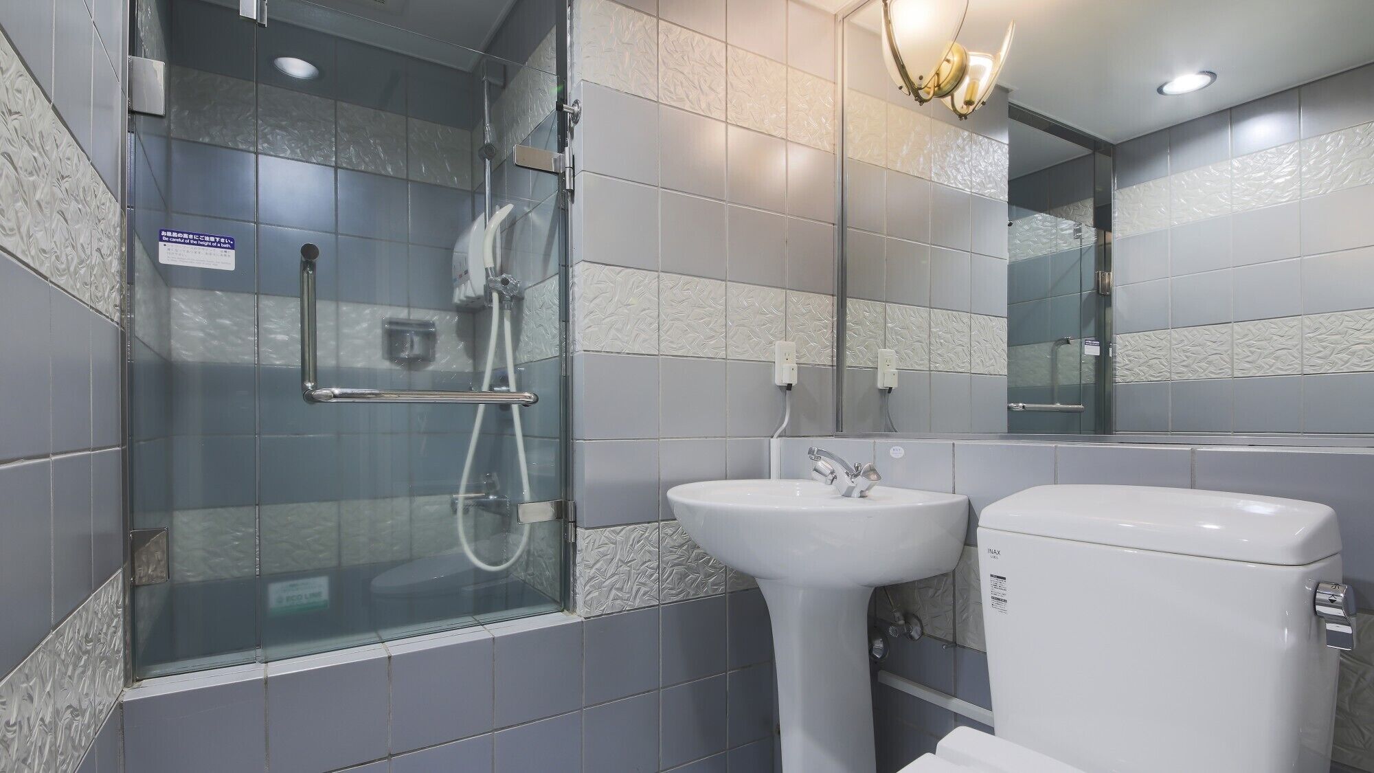 Shower, free toiletries, hair dryer, slippers