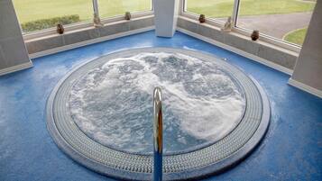 Indoor pool, open 8:00 AM to 7:30 PM, pool loungers
