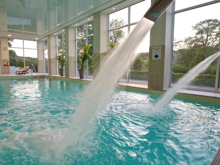 Indoor pool, open 8:00 AM to 7:30 PM, pool loungers