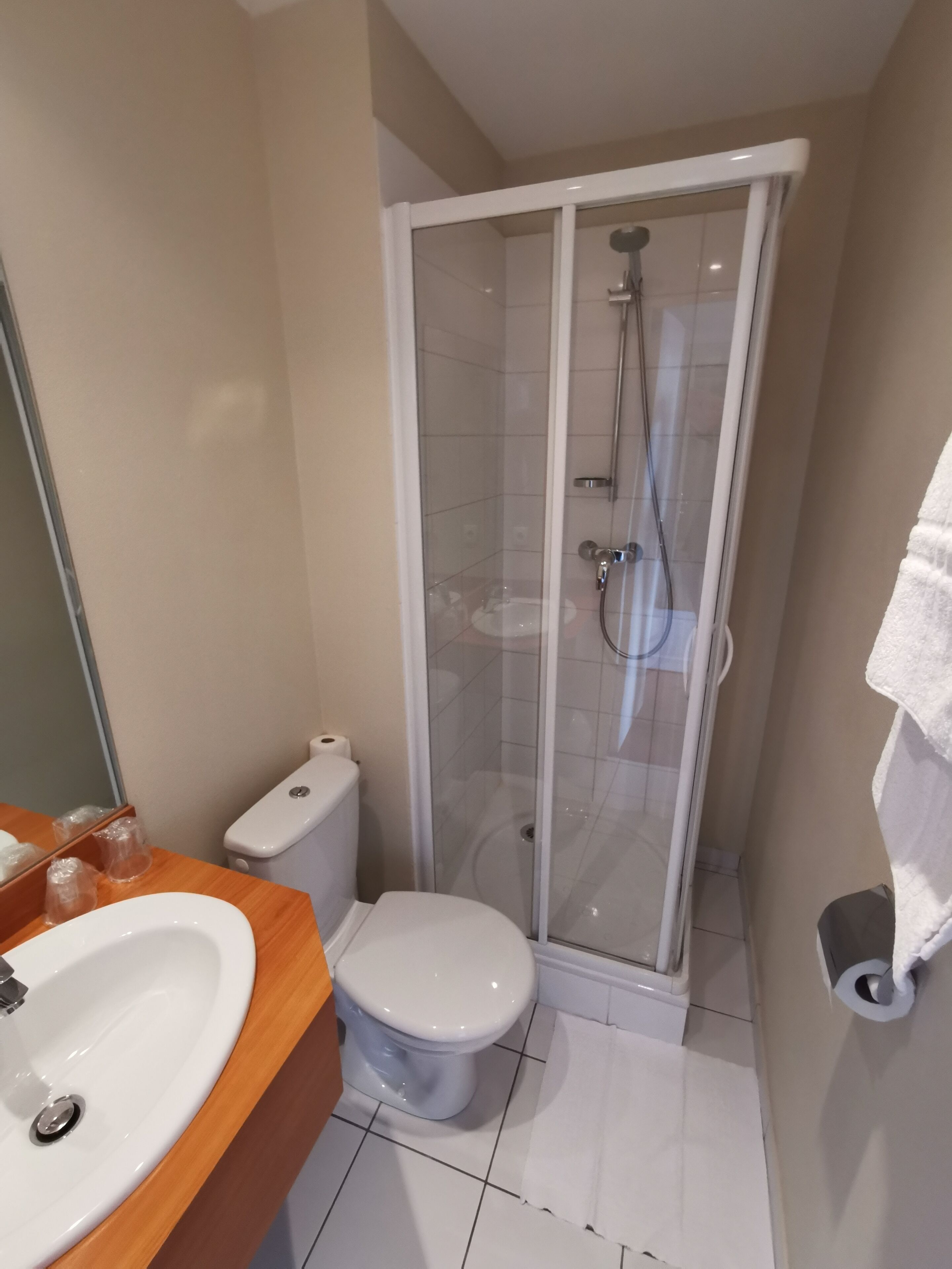 shower, free toiletries, hair dryer, towels