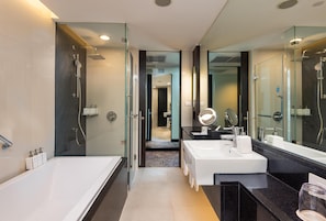 One Bedroom Suite with balcony | Bathroom | Free toiletries, hair dryer, bathrobes, slippers - Radisson Suites Bangkok Sukhumvit (Bangkok)