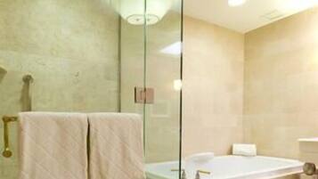 Combined shower/tub, hair dryer, towels, shampoo