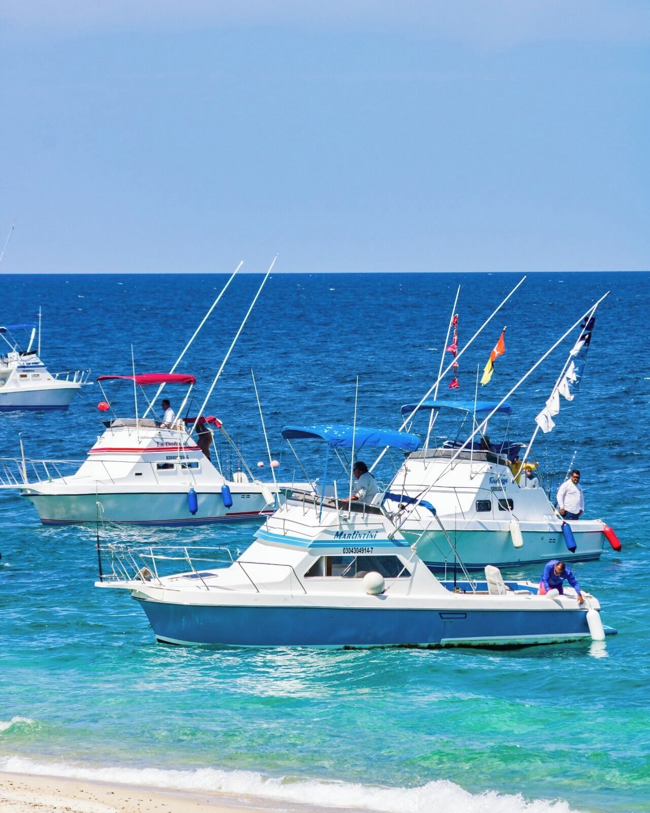 A marina with several boats docked.