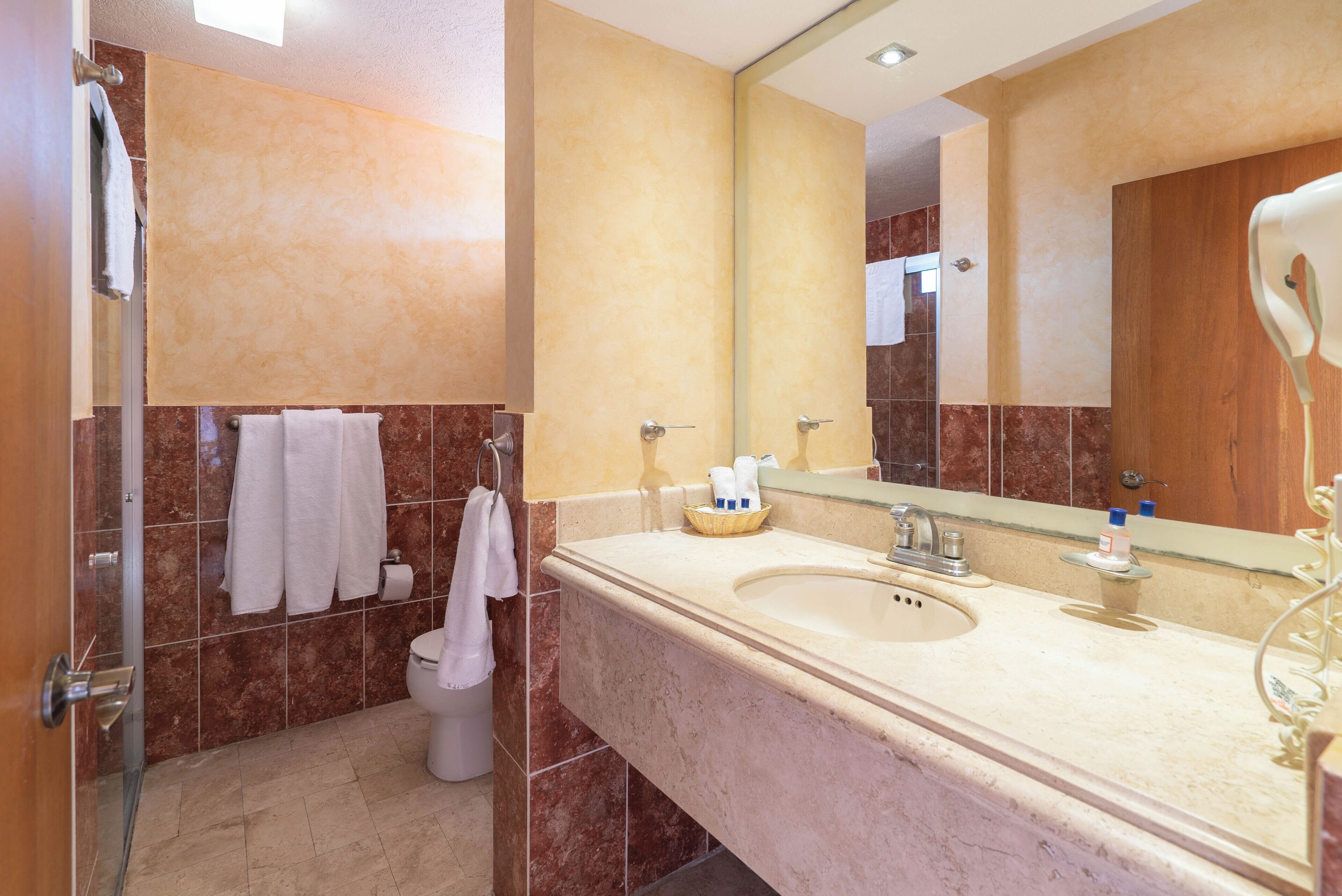 standard room, 2 double beds, garden area | bathroom | shower, free toiletries, hair dryer, towels