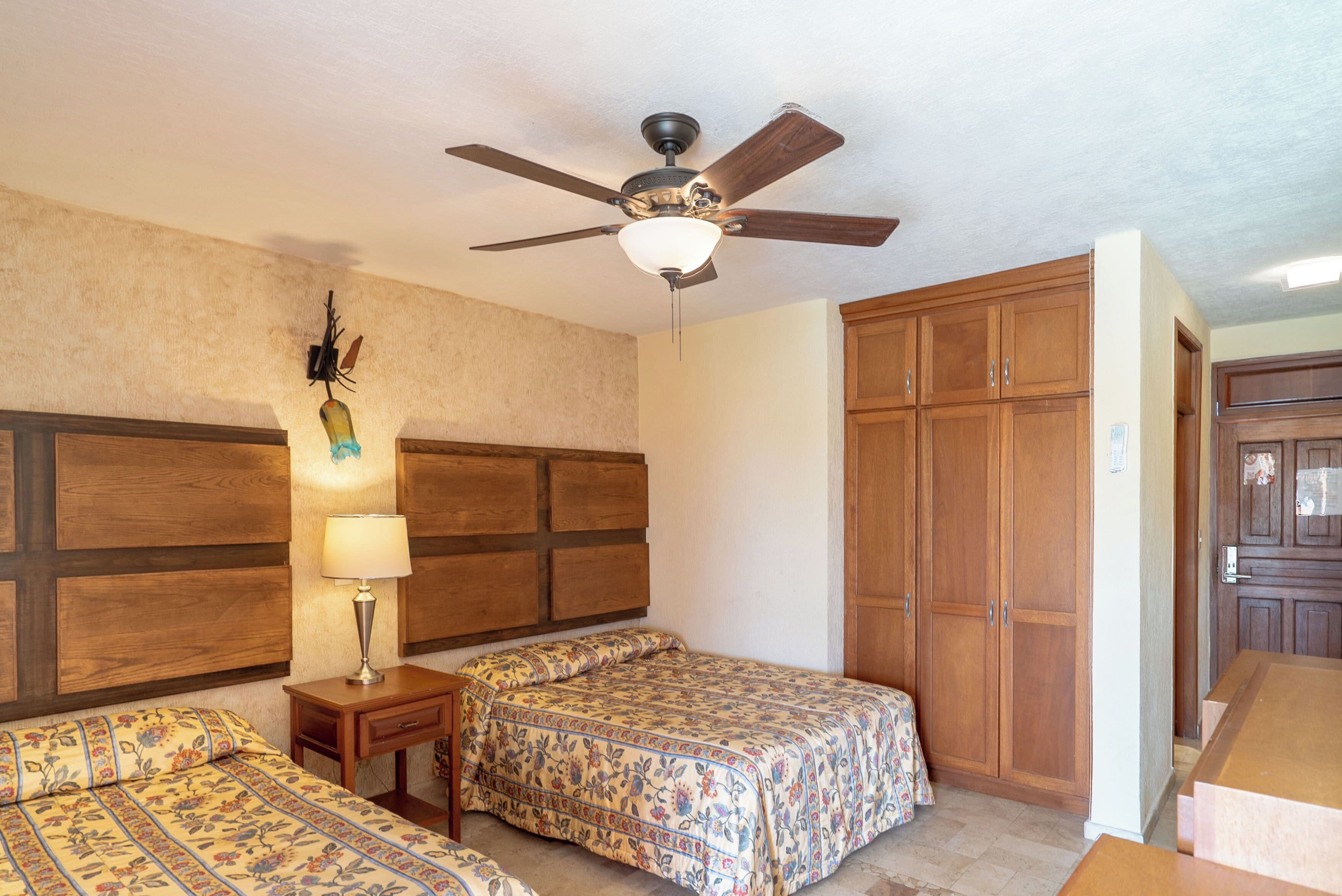 standard room, 2 double beds, garden area | in-room safe, individually furnished, iron/ironing board