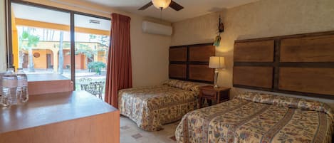 Standard Room, 2 Double Beds, Garden Area | In-room safe, individually furnished, iron/ironing board