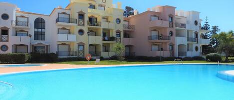 Outdoor pool, open 9:00 AM to 6:00 PM, pool umbrellas, sun loungers