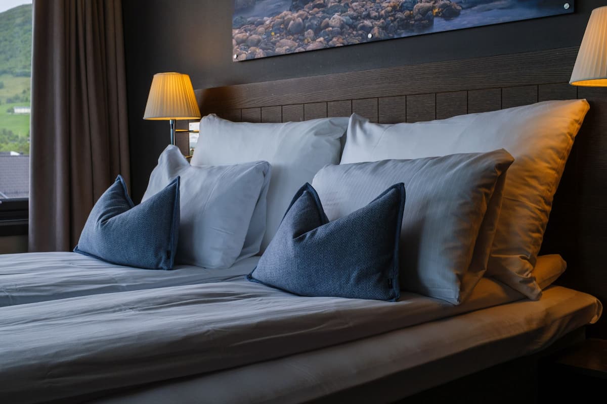 premium bedding, select comfort beds, desk, laptop workspace