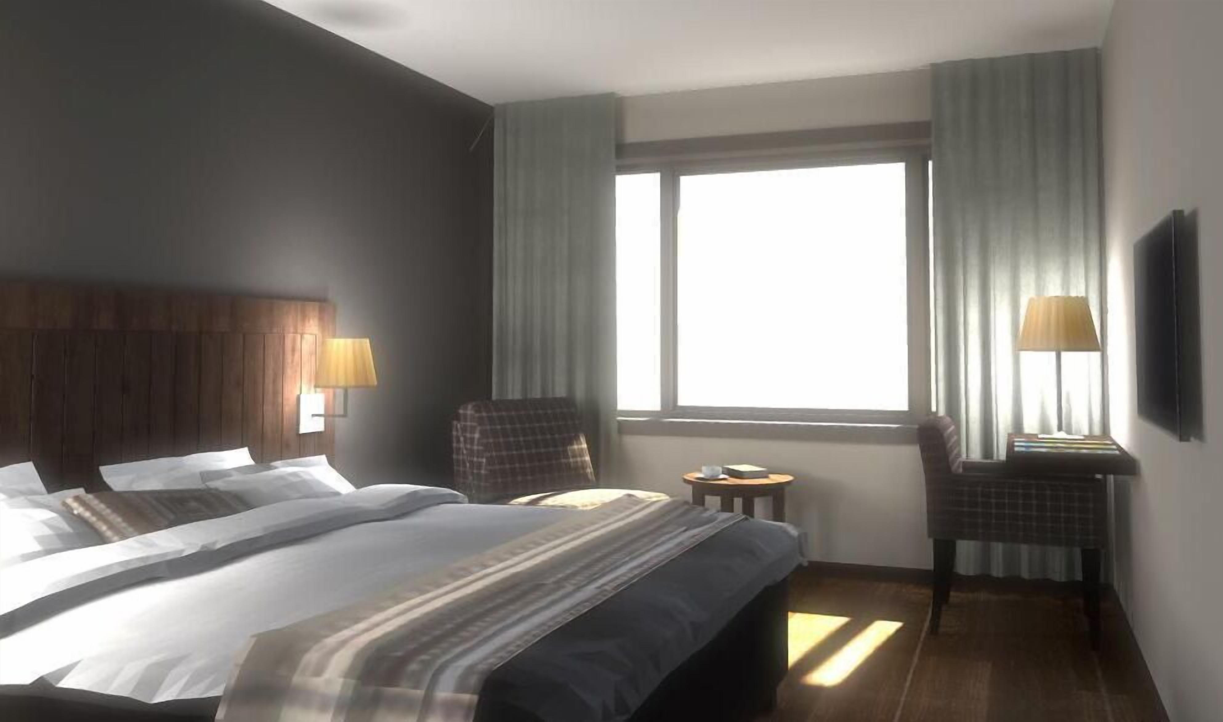 twin room | premium bedding, select comfort beds, desk, laptop workspace