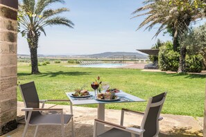 Breakfast, lunch, dinner served; Mediterranean cuisine, pool views 