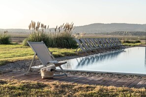 Outdoor pool, open 8:00 AM to 8:00 PM, pool umbrellas, sun loungers