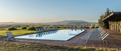 Outdoor pool, open 8:00 AM to 8:00 PM, pool umbrellas, sun loungers