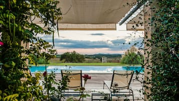 Outdoor pool, open 8:00 AM to 8:00 PM, pool umbrellas, sun loungers