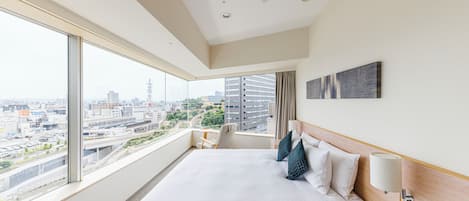 Premium bedding, down comforters, in-room safe, desk