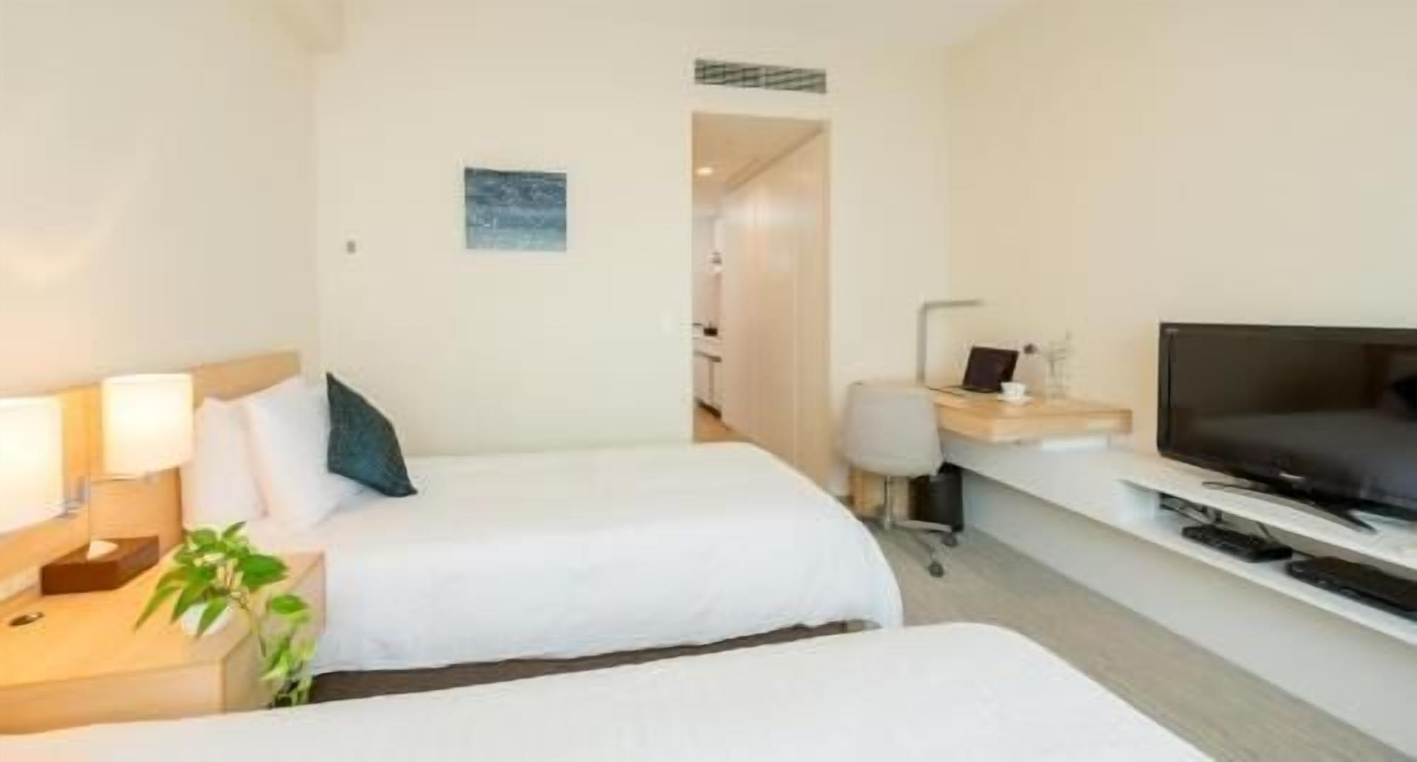 Premium bedding, down duvets, in-room safe, desk