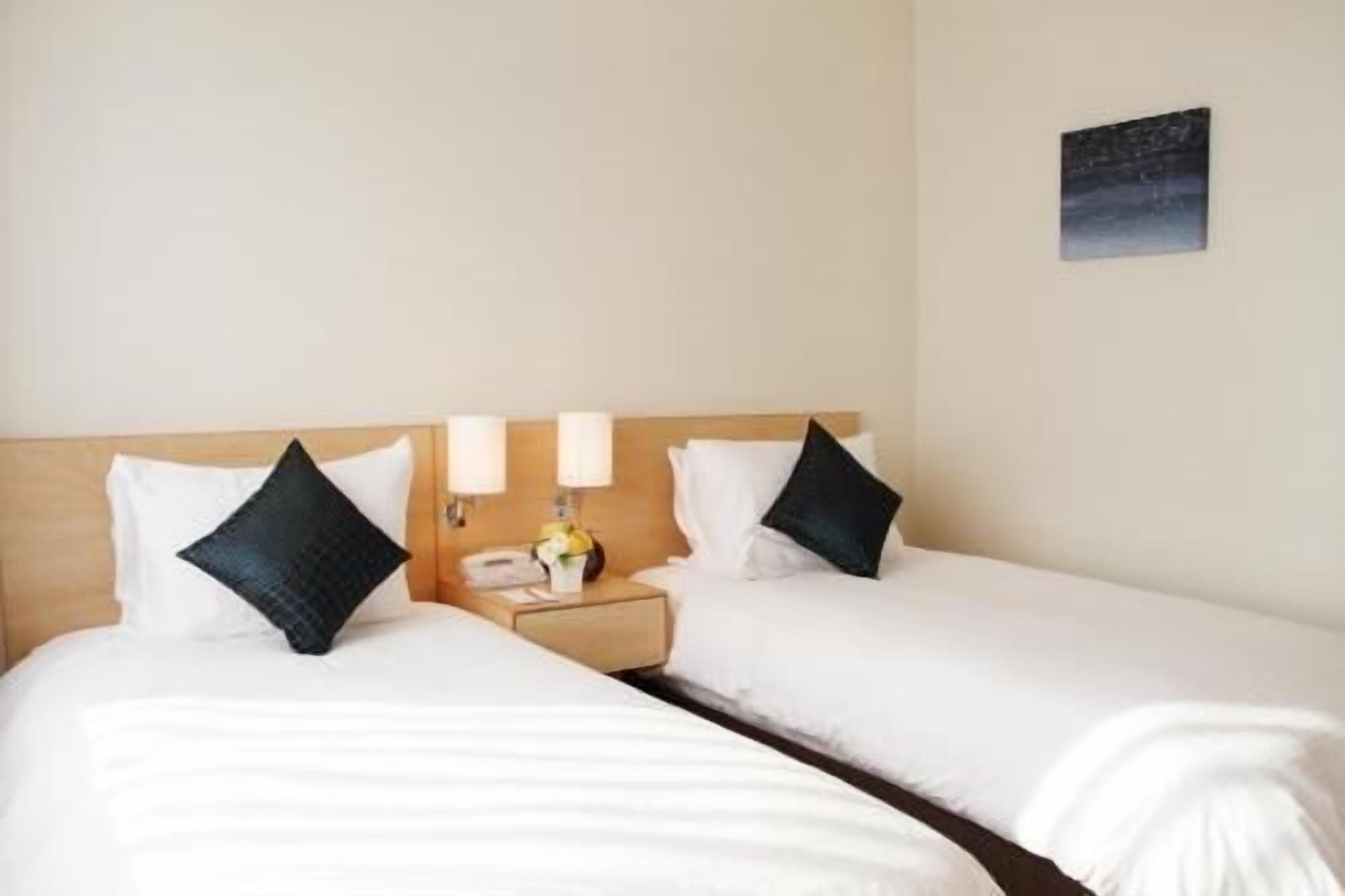 Premium bedding, down duvets, in-room safe, desk