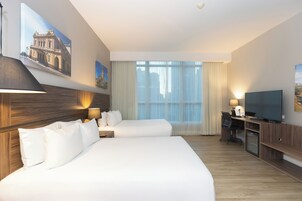 Deluxe Double Room, 2 Double Beds | Minibar, in-room safe, desk, laptop workspace