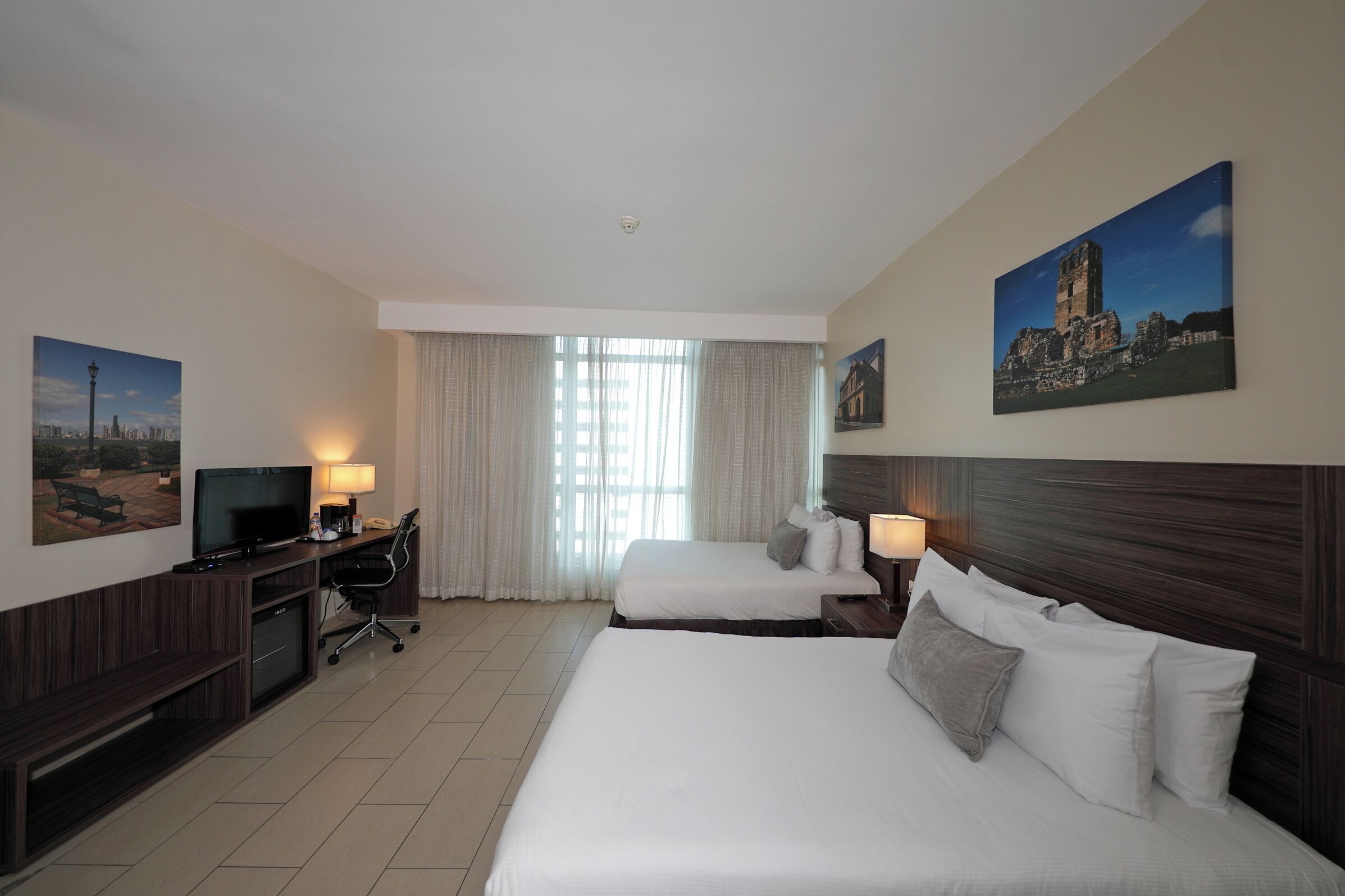 deluxe double room, 2 double beds | minibar, in-room safe, desk, laptop workspace