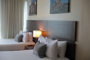 Deluxe Double Room, 2 Double Beds | Minibar, in-room safe, desk, laptop workspace - Victoria Hotel and Suites Panama (Panama City)